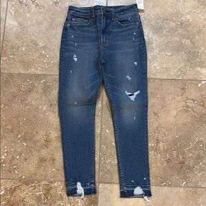 Distressed Blue Jeans
